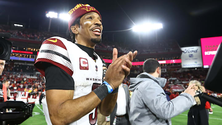 Washington Commanders quarterback Jayden Daniels celebrates after winning wild-card game. Washington Commanders quarterback Jayden Daniels celebrates after winning wild-card game.