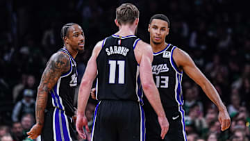 Jan 10, 2025; Boston, Massachusetts, USA; Sacramento Kings forward DeMar DeRozan (10), forward Keegan Murray (13) and forward Domantas Sabonis (11) react after defeating the Boston Celtics at TD Garden. Mandatory Credit: David Butler II-Imagn Images