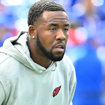 Sep 8, 2024; Orchard Park, New York, USA; Arizona Cardinals safety Budda Baker warms up before a game against the Buffalo Bills at Highmark Stadium. Mandatory Credit: Mark Konezny-Imagn Images