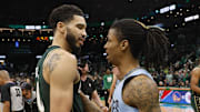 Feb 12, 2023; Boston, Massachusetts, USA; Boston Celtics forward Jayson Tatum (0) and Memphis Grizzlies guard Ja Morant (12) talks after the Celtics win at TD Garden. Mandatory Credit: Winslow Townson-Imagn Images