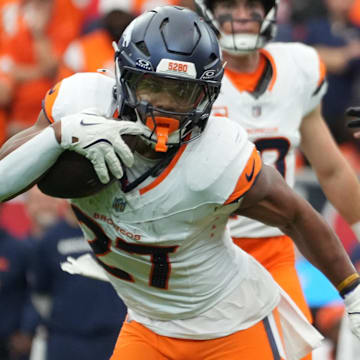 Nov 2, 2025; Houston, Texas, USA; Denver Broncos running back J.K. Dobbins (27) runs during the second half against the Houston Texans at NRG Stadium.