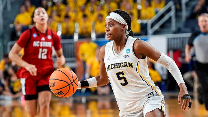 Michigan guard Brooke Q. Daniels (5) dribbles against N.C. State during the first half of NCAA Tournament Second Round at Crisler Center in Ann Arbor on Sunday, March 22, 2026.