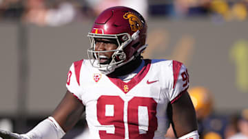 Oct 28, 2023; Berkeley, California, USA; USC Trojans defensive lineman Bear Alexander (90) gestures during the third quarter against the California Golden Bears at California Memorial Stadium. Mandatory Credit: Darren Yamashita-Imagn Images