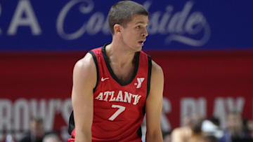 Atlanta Hawks forward/guard Nikola Durisic (7) controls the ball against Washington Wizards guard Bub Carrington (17) during the first half at Thomas & Mack Center.