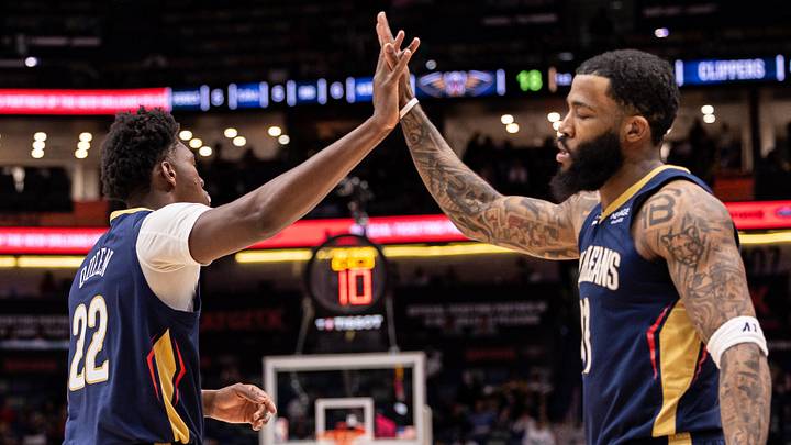 Mar 18, 2026; New Orleans, Louisiana, USA;  New Orleans Pelicans center Derik Queen (22) slaps hands with guard/forward Saddiq Bey (41) against the LA Clippers during first half at Smoothie King Center. Mandatory Credit: Stephen Lew-Imagn Images