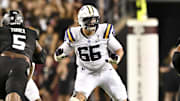 Oct 26, 2024; College Station, Texas, USA; LSU Tigers offensive tackle Will Campbell (66) in action during the second half against the Texas A&M Aggies. The Aggies defeated the Tigers 38-23; at Kyle Field. Mandatory Credit: Maria Lysaker-Imagn Images.  