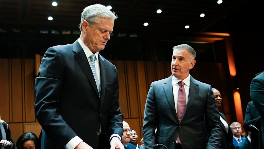 NCAA President Charlie Baker, left, Tony Petitti, Commissioner, Big Ten Conference, right