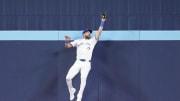 Jun 30, 2024; Toronto, Ontario, CAN; Toronto Blue Jays center fielder Kevin Kiermaier (39) catches a fly ball for the second out against the New York Yankees during the eighth inning at Rogers Centre. Mandatory Credit: Nick Turchiaro-USA TODAY Sports