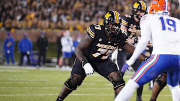 Nov 18, 2023; Columbia, Missouri, USA; Missouri Tigers offensive lineman Armand Membou (79) at the line of scrimmage against the Florida Gators during the game at Faurot Field at Memorial Stadium. Mandatory Credit: Denny Medley-Imagn Images