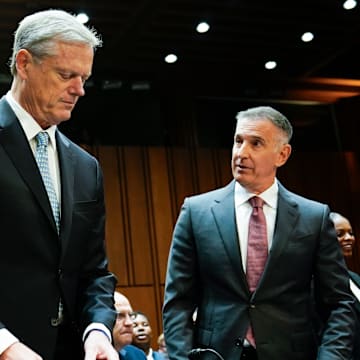 NCAA President Charlie Baker, left, Tony Petitti, Commissioner, Big Ten Conference, right