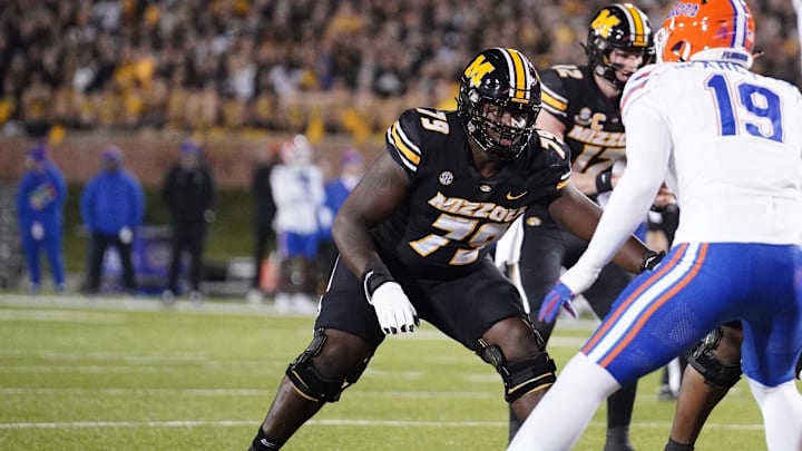 Nov 18, 2023; Columbia, Missouri, USA; Missouri Tigers offensive lineman Armand Membou (79) at the line of scrimmage against the Florida Gators during the game at Faurot Field at Memorial Stadium. Mandatory Credit: Denny Medley-Imagn Images