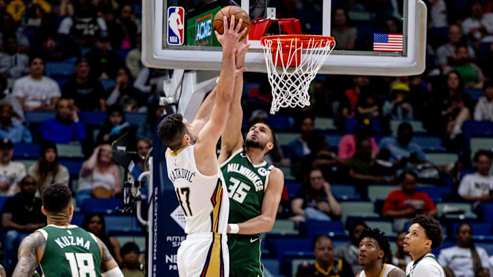 Milwaukee Bucks forward Pete Nance blocks the shot of New Orleans Pelicans center Karlo Matkovic during the first half at Smoothie King Center on Sunday.