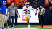 Oct 18, 2025; Syracuse, New York, USA; Pittsburgh Panthers defensive back Kavir Bains (23) returns an interception against the Syracuse Orange during the second half at the JMA Wireless Dome. Mandatory Credit: Rich Barnes-Imagn Images