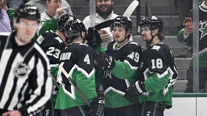 Mar 22, 2026; Dallas, Texas, USA; Dallas Stars center Colin Blackwell (15) and center Sam Steel (18) and center Justin Hryckowian (49) and defenseman Miro Heiskanen (4)  celebrates a goal scored by Hryckowian against the Vegas Golden Knights during the first period at the American Airlines Center. Mandatory Credit: Jerome Miron-Imagn Images