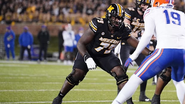  Missouri Tigers offensive lineman Armand Membou (79) at the line of scrimmage