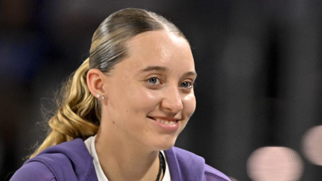 Oct 6, 2025; Fort Worth, Texas, USA; Dallas Wings guard Paige Bueckers (left) talks with TCU women’s basketball coach Mark Campbell (right) during the second quarter at Dickie's Arena. Mandatory Credit: Jerome Miron-Imagn Images Oct 6, 2025; Fort Worth, Texas, USA; Dallas Wings guard Paige Bueckers (left) talks with TCU women’s basketball coach Mark Campbell (right) during the second quarter at Dickie's Arena. Mandatory Credit: Jerome Miron-Imagn Images