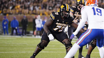 Nov 18, 2023; Columbia, Missouri, USA; Missouri Tigers offensive lineman Armand Membou (79) at the line of scrimmage against the Florida Gators during the game at Faurot Field at Memorial Stadium. Mandatory Credit: Denny Medley-Imagn Images