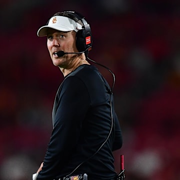 Sep 20, 2025; Los Angeles, California, USA; Southern California Trojans head coach Lincoln Riley watches game action against the Michigan State Spartans during the second half at the Los Angeles Memorial Coliseum. Mandatory Credit: Gary A. Vasquez-Imagn Images