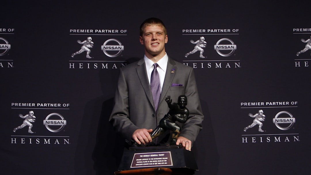 Dec 8, 2012; New York, NY, USA; Kansas State Wildcats quarterback Collin Klein poses for a photo with the Heisman Trophy during a press conference before the announcement of the 2012 Heisman Trophy winner at the Marriott Marquis in downtown New York City.  Mandatory Credit: Jerry Lai-Imagn Images