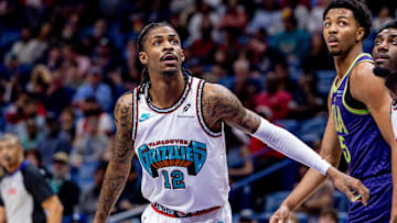 Mar 9, 2025; New Orleans, Louisiana, USA;  Memphis Grizzlies guard Ja Morant (12) looks on against the New Orleans Pelicans during the first half at Smoothie King Center. Mandatory Credit: Stephen Lew-Imagn Images