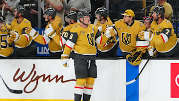 Oct 11, 2024; Las Vegas, Nevada, USA; Vegas Golden Knights center Jack Eichel (9) celebrates with team mates after scoring a goal against the St. Louis Blues during the first period at T-Mobile Arena. Mandatory Credit: Stephen R. Sylvanie-Imagn Images