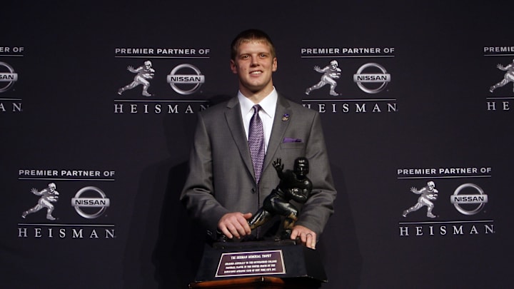 Dec 8, 2012; New York, NY, USA; Kansas State Wildcats quarterback Collin Klein poses for a photo with the Heisman Trophy during a press conference before the announcement of the 2012 Heisman Trophy winner at the Marriott Marquis in downtown New York City.  Mandatory Credit: Jerry Lai-Imagn Images