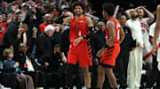 Mar 16, 2025; Portland, Oregon, USA;  Portland Trail Blazers guard Matisse Thybulle (4) reacts after blocking a three-point attempt by Toronto Raptors center Orlando Robinson (21) in the second half at Moda Center. Mandatory Credit: Jaime Valdez-Imagn Images