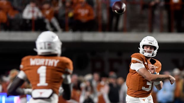 Texas QB Quinn Ewers (3) throw a pass during against Texas Tech in  November 2023 at Darrell K. Royal-Texas Memorial Stadium.
