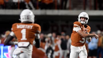 Texas' quarterback Quinn Ewers (3) throws the ball to Texas' wide receiver Xavier Worthy (1) during the game against Texas Tech, Friday, Nov. 24, 2023, at Darrell K. Royal-Texas Memorial Stadium in Austin.