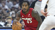 Apr 20, 2025; Cleveland, Ohio, USA; Miami Heat guard Davion Mitchell (45) dribbles in the first quarter against the Cleveland Cavaliers at Rocket Arena. Mandatory Credit: David Richard-Imagn Images