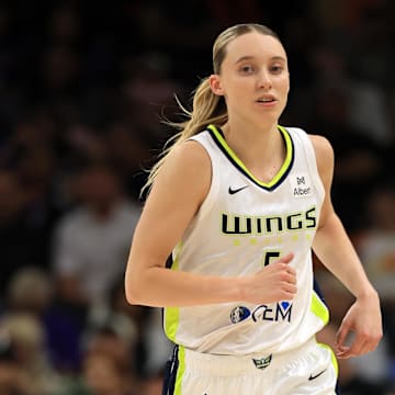 Jun 11, 2025; Phoenix, Arizona, USA; Dallas Wings guard Paige Bueckers (5) against the Phoenix Mercury at PHX Arena. Mandatory Credit: Mark J. Rebilas-Imagn Images