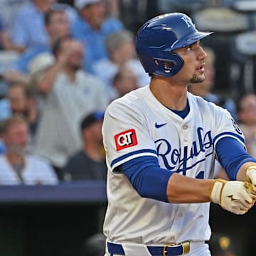 Jul 9, 2025; Kansas City, Missouri, USA;  Kansas City Royals right fielder Jac Caglianone (14) hits a two-run home run in the fourth inning against the Pittsburgh Pirates at Kauffman Stadium. Mandatory Credit: Peter Aiken-Imagn Images