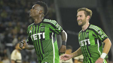 Sep 18, 2024; Los Angeles, California, USA; Austin FC forward Jader Obrian (11) celebrates with defender Jon Gallagher (17) after scoring a goal against LAFC in the first half at BMO Stadium. Mandatory Credit: Jayne Kamin-Oncea-Imagn Images