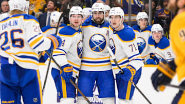 Feb 8, 2025; Nashville, Tennessee, USA;  Buffalo Sabres right wing Alex Tuch (89) celebrates his goal with his teammates  against the Nashville Predators during the second period at Bridgestone Arena. Mandatory Credit: Steve Roberts-Imagn Images