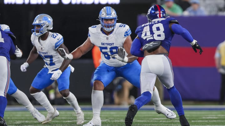 Detroit Lions offensive tackle Giovanni Manu (59).