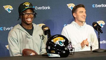 The Jacksonville Jaguars’ first-round pick, wide receiver and defensive back Travis Hunter with team GM James Gladstone