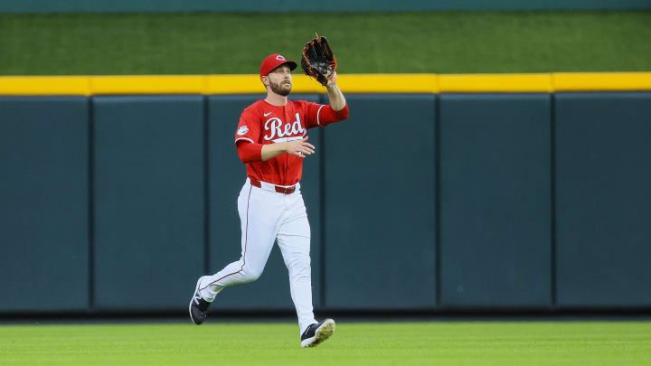 Jul 10, 2024; Cincinnati, Ohio, USA; Cincinnati Reds outfielder Austin Slater (48) catches a fly out hit by Colorado Rockies outfielder Nolan Jones (not pictured) in the sixth inning at Great American Ball Park. Mandatory Credit: Katie Stratman-USA TODAY Sports