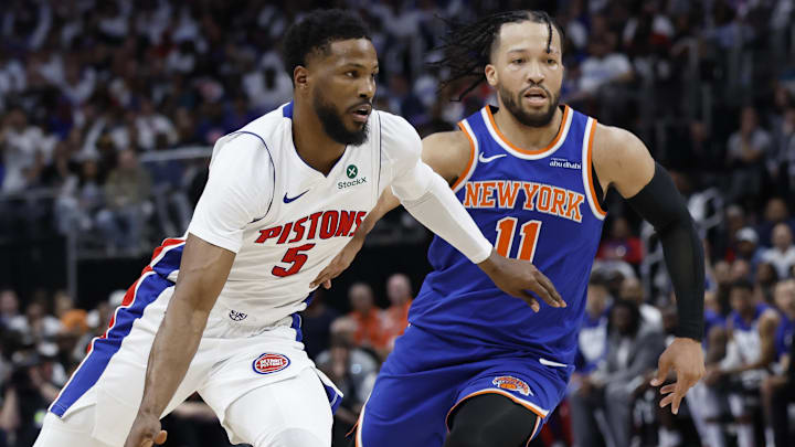 Former Detroit Pistons guard Malik Beasley (5) dribbles on New York Knicks guard Jalen Brunson (11) in the second half during game three of the first round of the 2024 NBA Playoffs at Little Caesars Arena.
