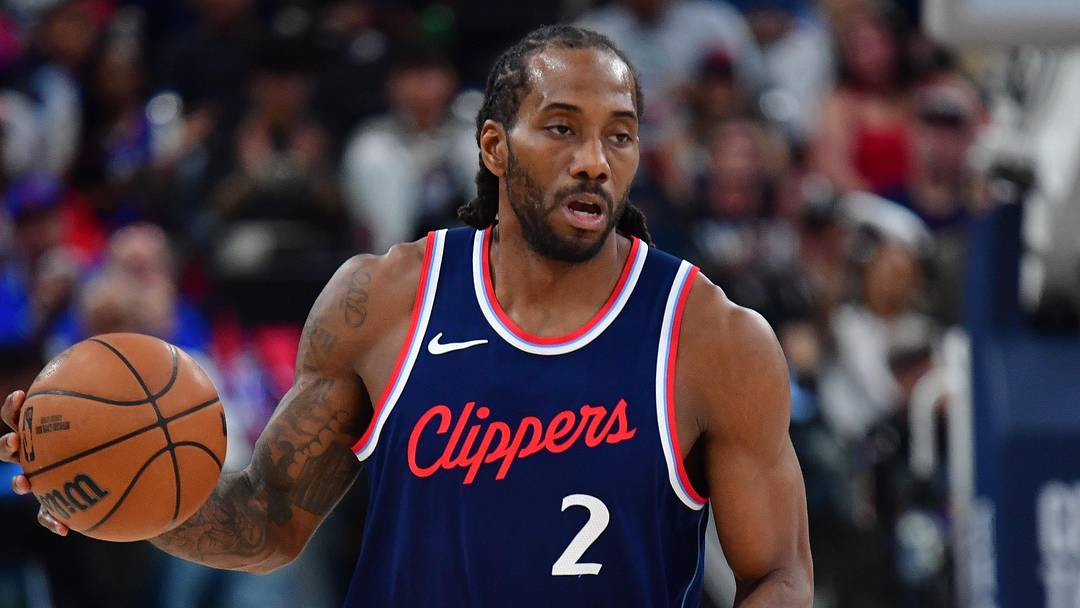 Apr 24, 2025; Inglewood, California, USA; LA Clippers forward Kawhi Leonard (2) moves the ball up court against the Denver Nuggets during the second half of Game 3 in the first round for the 2024 NBA Playoffs at Intuit Dome.