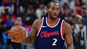 Apr 24, 2025; Inglewood, California, USA; LA Clippers forward Kawhi Leonard (2) moves the ball up court against the Denver Nuggets during the second half of Game 3 in the first round for the 2024 NBA Playoffs at Intuit Dome.