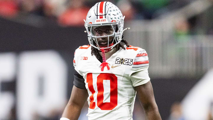 Jan 20, 2025; Atlanta, GA, USA; Ohio State Buckeyes cornerback Denzel Burke (10) against the Notre Dame Fighting Irish during the CFP National Championship college football game at Mercedes-Benz Stadium. Mandatory Credit: Mark J. Rebilas-Imagn Images