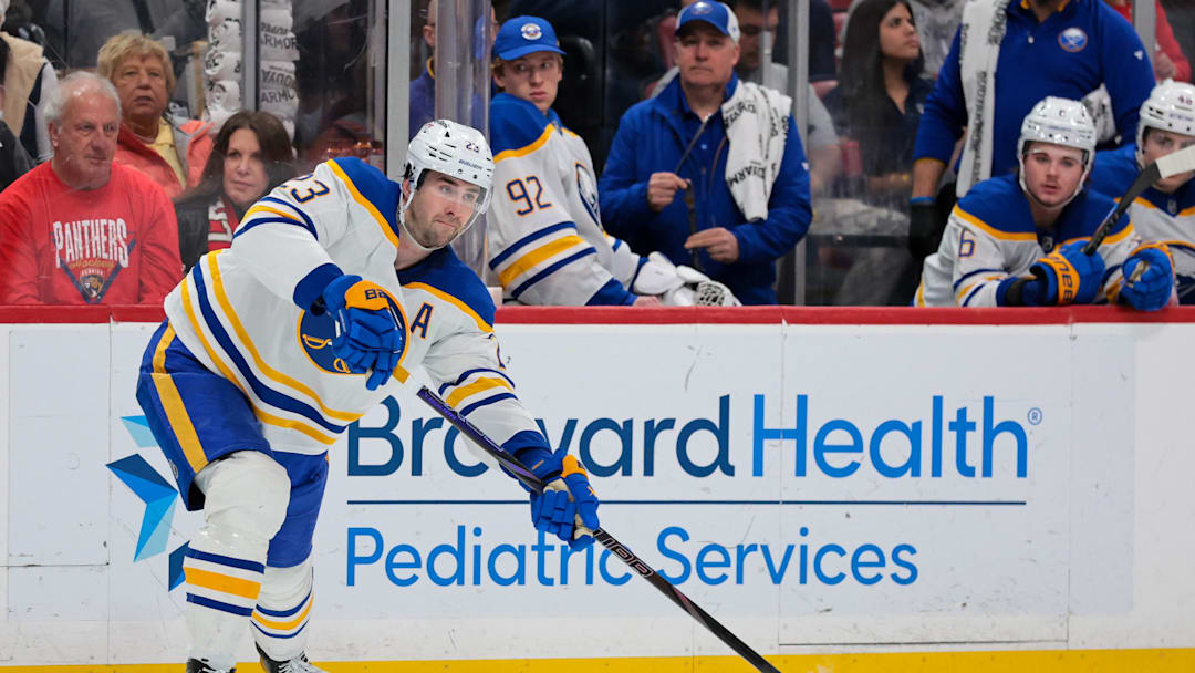 Feb 2, 2026; Sunrise, Florida, USA; Buffalo Sabres defenseman Mattias Samuelsson (23) moves the puck against the Florida Panthers during the second period at Amerant Bank Arena. Mandatory Credit: Sam Navarro-Imagn Images