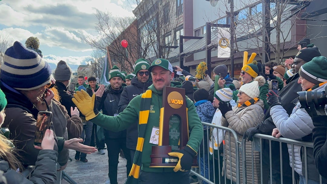 Vermont men's soccer head coach Rob Dow during the national championship parade in Burlington, Vermont. 