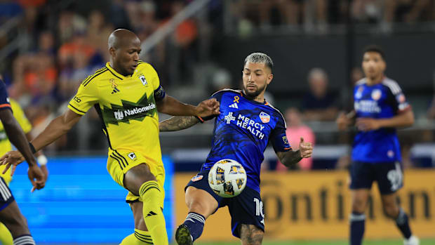 Columbus Crew midfielder Darlington Nagbe battles FC Cincinnati midfielder Luciano Acosta.