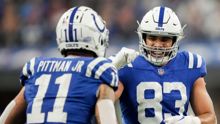 Indianapolis Colts tight end Kylen Granson (83) celebrates a play with Indianapolis Colts wide receiver Michael Pittman Jr. (11) on Sunday, Dec. 31, 2023, during a game against the Las Vegas Raiders at Lucas Oil Stadium in Indianapolis.