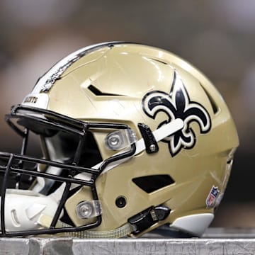 Aug 22, 2015; New Orleans, LA, USA; A New Orleans Saints helmet on the bench in the second half of their game against the New England Patriots at Mercedes-Benz Superdome. The Patriots won, 26-24. Mandatory Credit: Chuck Cook-Imagn Images