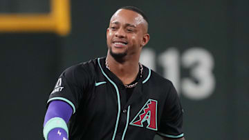 Sep 17, 2025; Phoenix, Arizona, USA; Arizona Diamondbacks second base Ketel Marte (4) reacts against the San Francisco Giants in the first inning at Chase Field. Mandatory Credit: Rick Scuteri-Imagn Images
