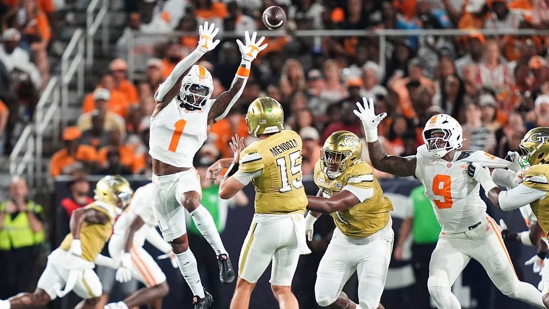 Tennessee defensive back TJ Metcalf (1) attempts to block a pass from Georgia Tech quarterback Alberto Mendoza (15) during a college football game between Tennessee and Georgia Tech at Bobby Dodd Stadium in Atlanta, Ga., on Sept. 12, 2026. Tennessee defensive back TJ Metcalf (1) attempts to block a pass from Georgia Tech quarterback Alberto Mendoza (15) during a college football game between Tennessee and Georgia Tech at Bobby Dodd Stadium in Atlanta, Ga., on Sept. 12, 2026.