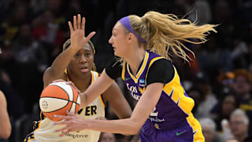 May 24, 2024; Los Angeles, California, USA;  Indiana Fever forward NaLyssa Smith (1) defends Los Angeles Sparks forward Cameron Brink (22) in the first half at Crypto.com Arena. Mandatory Credit: Jayne Kamin-Oncea-Imagn Images