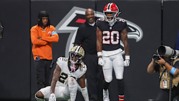 Sep 29, 2024; Atlanta, Georgia, USA; Atlanta Falcons cornerback Dee Alford (20) stands over New Orleans Saints wide receiver Rashid Shaheed (22) after a pass break up in the fourth quarter at Mercedes-Benz Stadium.